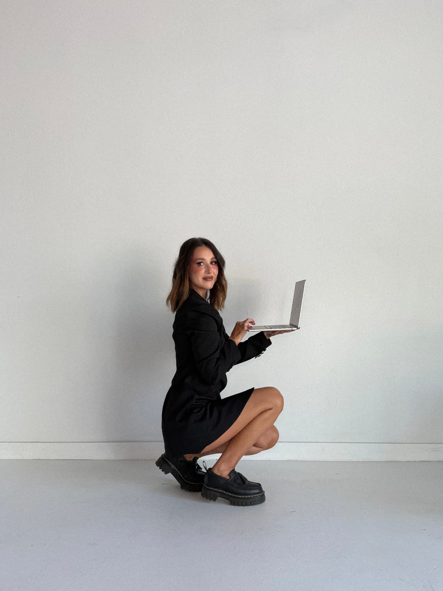 Aubrey Stewart working on a laptop